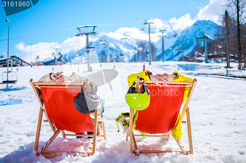 Image of Couple at mountains in winter