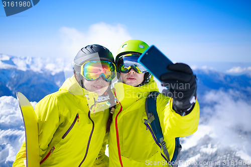 Image of Young couple taking a selfie