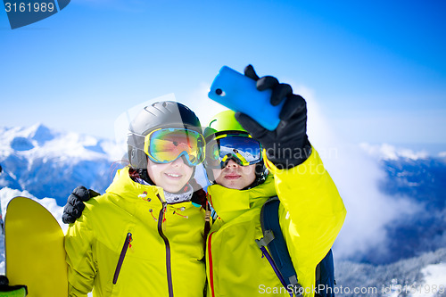 Image of Young couple taking a selfie