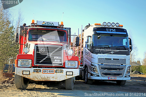 Image of Volvo N12 and Volvo FH16 Past and Present Trucks Side By Side 