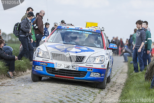 Image of The Car of FDJ.fr Team on the Roads of Paris Roubaix Cycling Rac