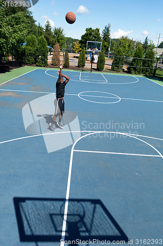 Image of Three Point Basketball Shooter