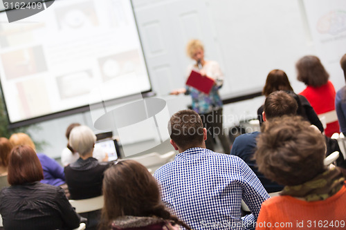 Image of Woman lecturing at university.