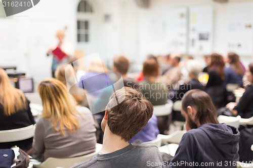 Image of Woman lecturing at university.