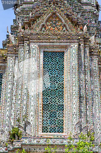 Image of window   in  gold    temple    bangkok  tree