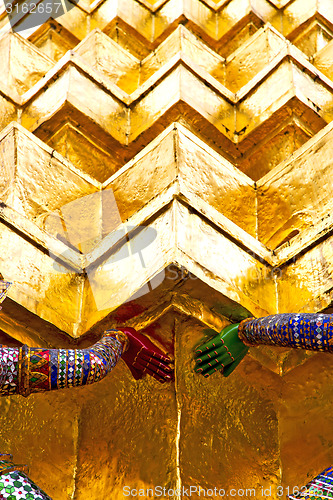 Image of  pavement gold    temple   in   bangkok hands