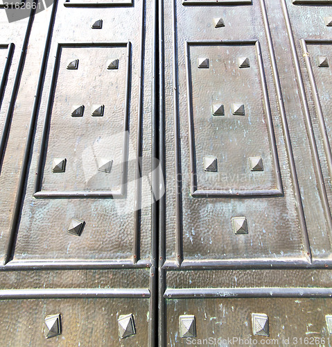 Image of  in mercallo rusty brass brown knocker door curch  closed metal 