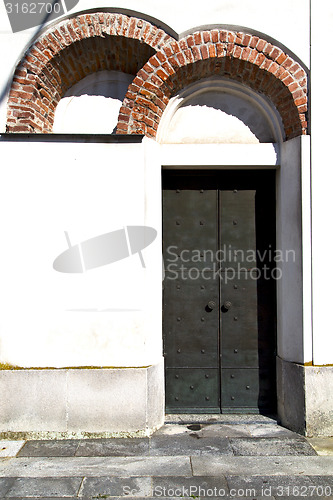 Image of caiello  abstract   rusty   door curch  closed  italy  lombardy 