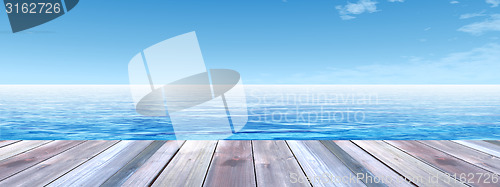 Image of Conceptual wood deck over sea and sky banner