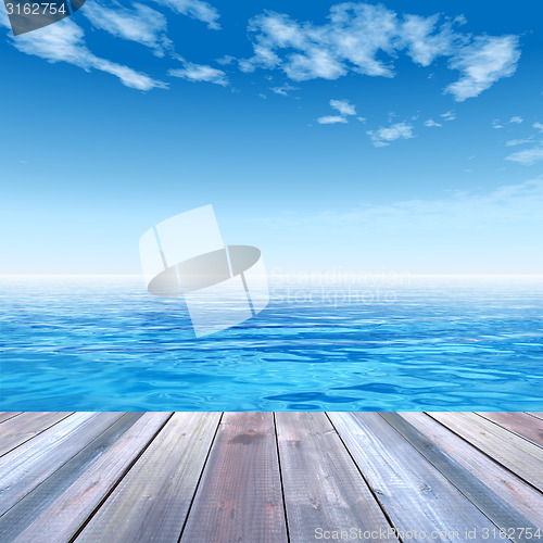Image of Conceptual wood deck over sea and sky