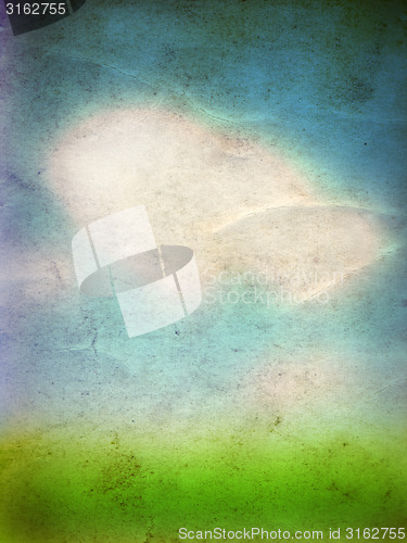Image of Conceptual green grass and sky old paper