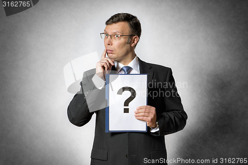 Image of Businessman with question mark