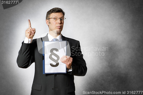 Image of Businessman with folder and paragraph sign