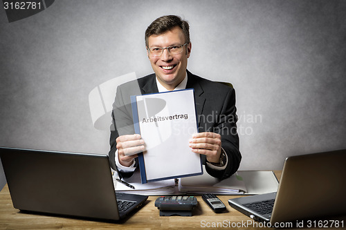 Image of Businessman with employment contract