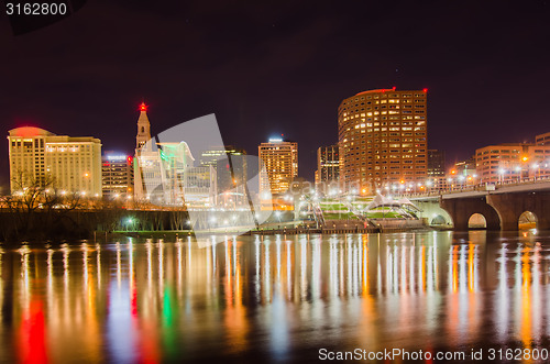 Image of The skyline of downtown Hartford, Connecticut at dusk from acros