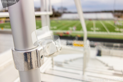 Image of handrail connector at a sports stadium steps