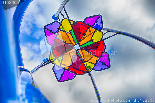 Image of colorful playground structure elements with sky