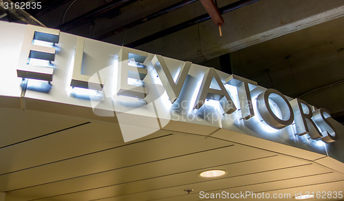 Image of lit elevator sign aluminum letters