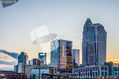 Image of charlotte skyline at dawn hours on a spring evening