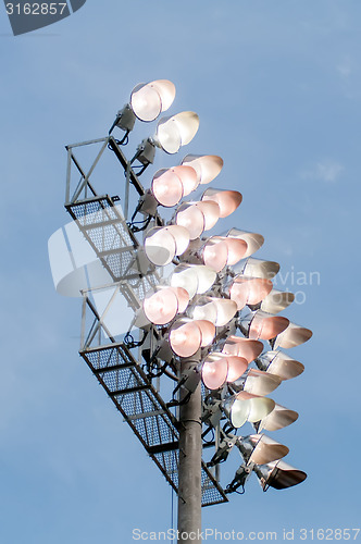 Image of Stadium lights turn on at twilight time