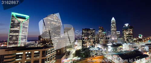 Image of view of charlotte skyline aerial at sunset