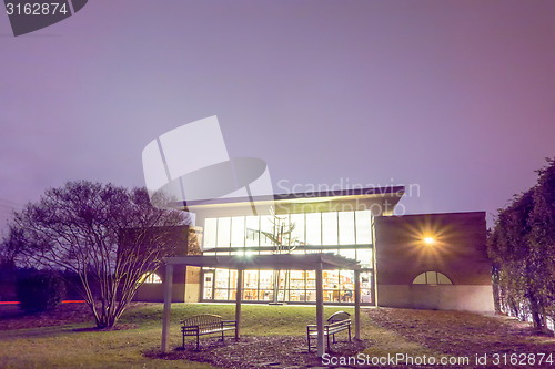Image of modern view of public library at night