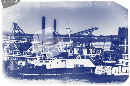 Image of Ships moored at a shipyard