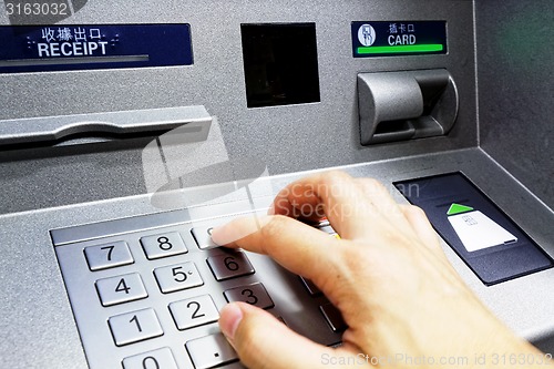 Image of ATM - entering pin