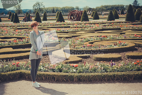 Image of France,  Versailles - June 17, 2011: women in versailles garden