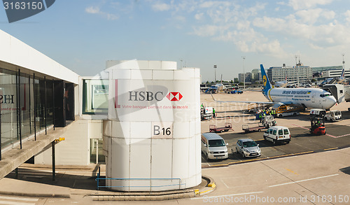 Image of France, Paris - June 17, 2011: Boeing connected to passenger boarding bridge at Charles de Gaulle Airport. Air France is the French flag carrier headquartered in Tremblay-en-France.