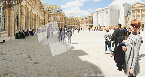 Image of France,  Versailles - June 17, 2011: women in versailles garden