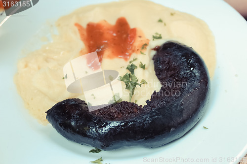 Image of mashed potato and home made black pudding