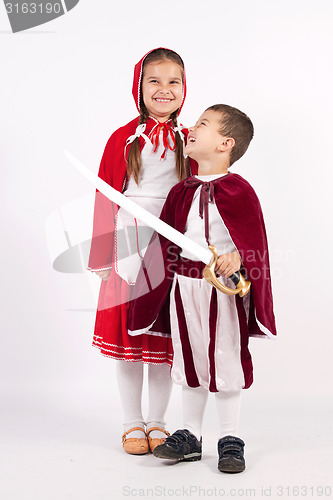 Image of Girl and boy in costumes from fairy tales