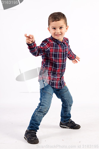 Image of Little boy dancing