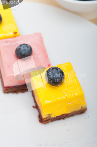 Image of strawberry and mango mousse dessert cake