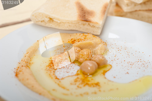 Image of Hummus with pita bread 