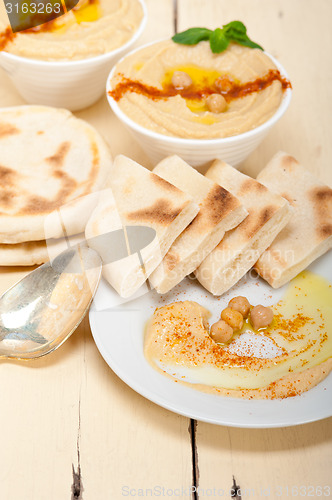 Image of Hummus with pita bread 