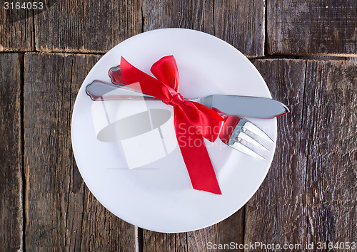 Image of fork and knife on a table