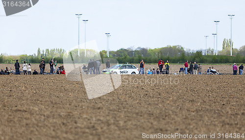 Image of The Car of BelkinTeam on the Roads of Paris Roubaix Cycling Race