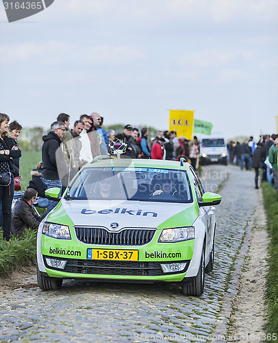 Image of The Car of BelkinTeam on the Roads of Paris Roubaix Cycling Race