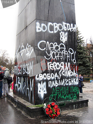 Image of pedestal of thrown monument to Lenin
