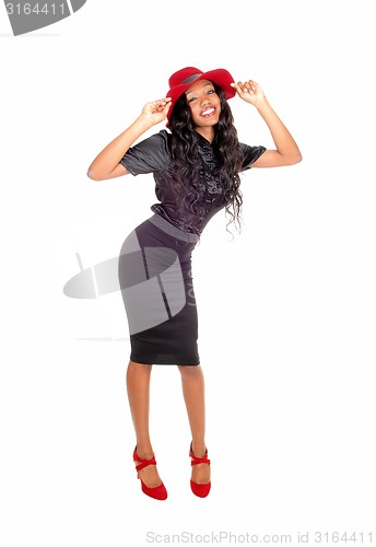 Image of Pretty tall black woman standing.