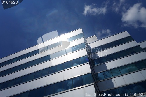 Image of Business building with blue sky