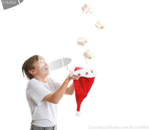 Image of Boy catching falling presents