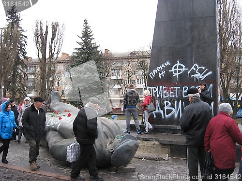 Image of thrown bronze monument to Lenin in winter 22, 2014