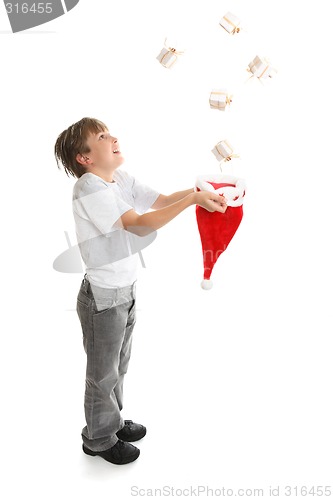 Image of Boy catching presents