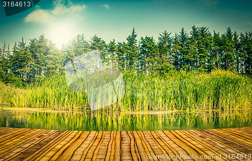 Image of Bridge by a lake