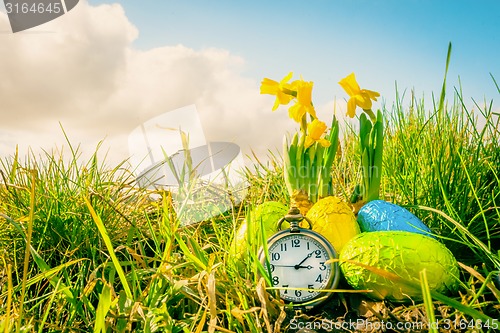 Image of Easter eggs and a clock