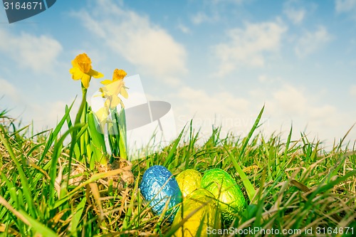 Image of Easter eggs with daffodils