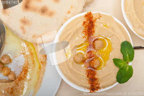Image of Hummus with pita bread 